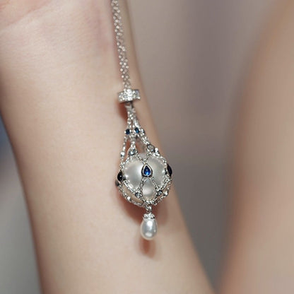 14,0-15,0 mm Makeanveden helmi & sininen jalokivi Lavalier-riipus