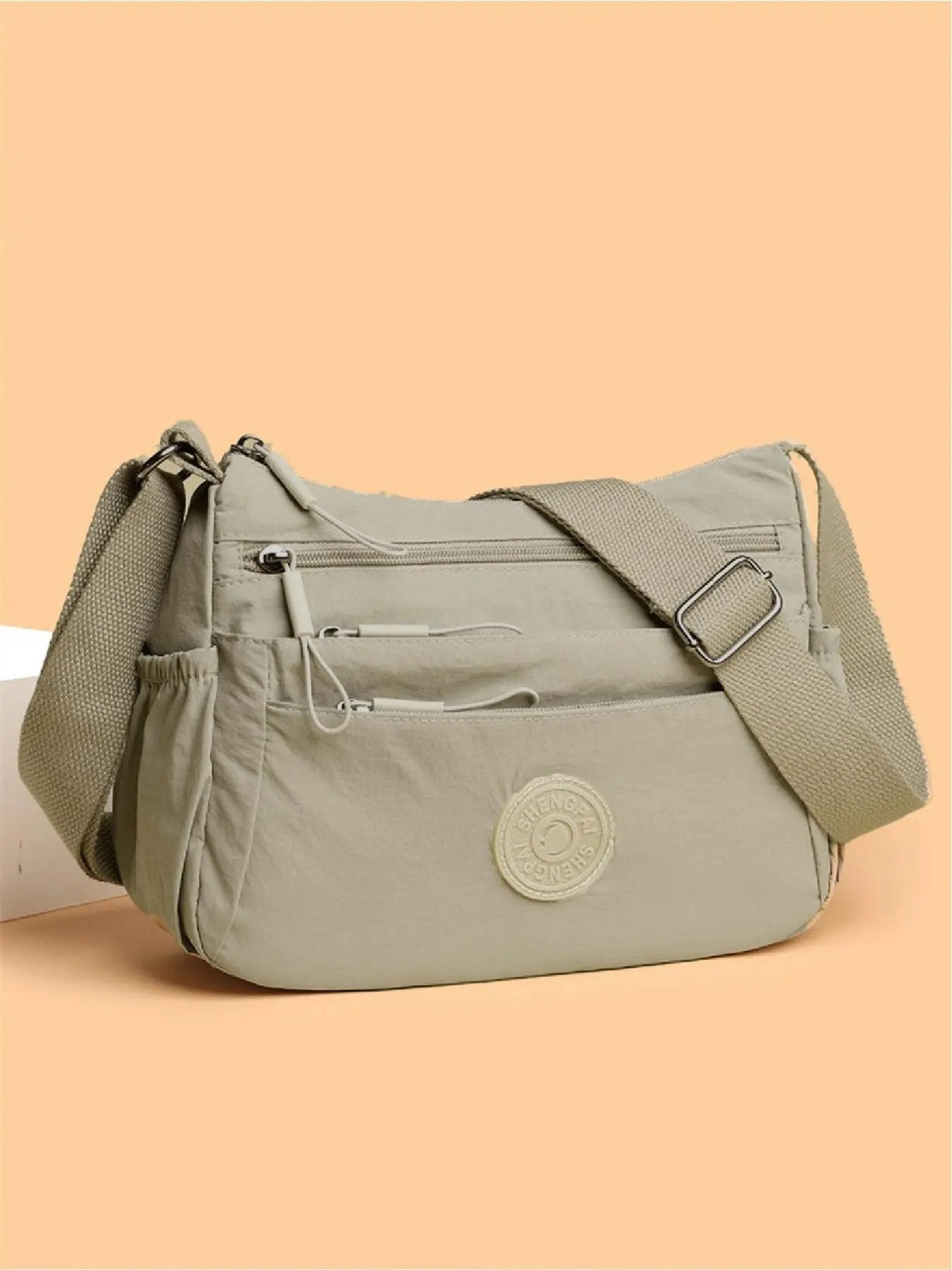 Hold orden på farten: Letvægts crossbody-taske med 5 smarte lynlåslommer ✨👜