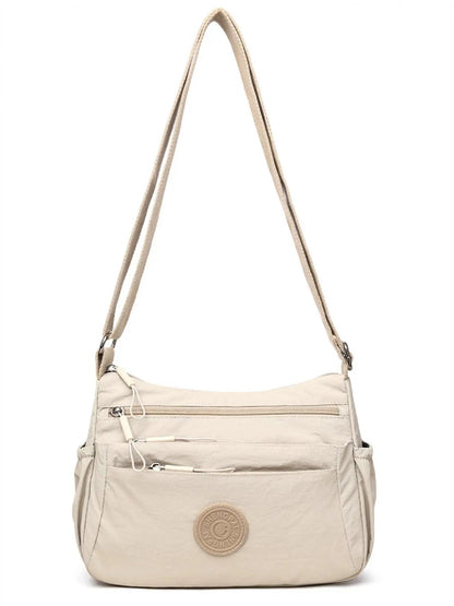 Hold orden på farten: Letvægts crossbody-taske med 5 smarte lynlåslommer ✨👜