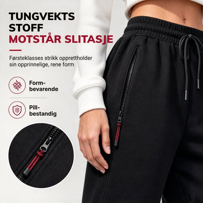 Damejoggingbukser i fleece med lynlåslommer